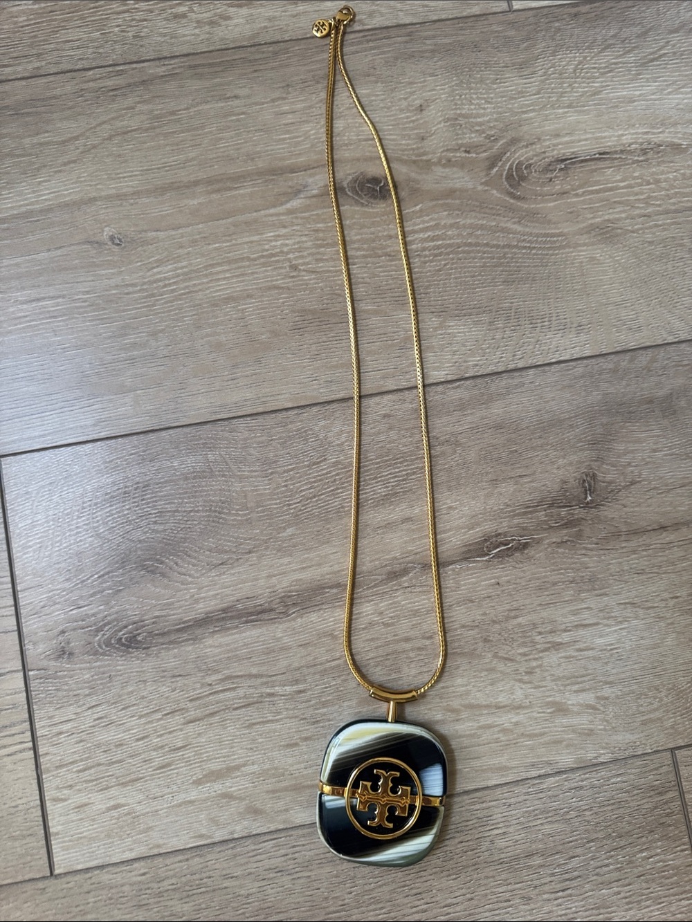 Tory Burch Gold-Tone Black and Cream Logo Pendant Necklace